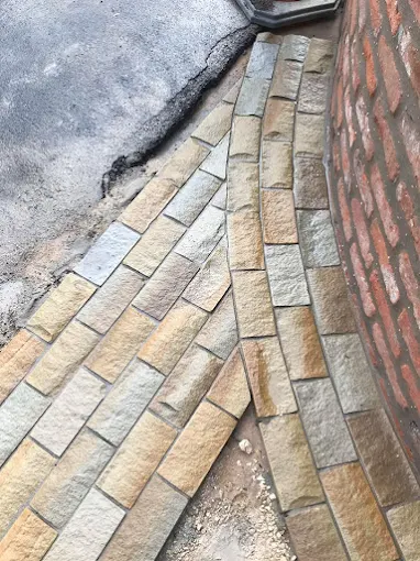 Curved natural stone brickwork detail